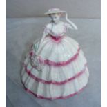A Coalport figurine entitled "Carnation" from "The Four Flowers Collection" limited edition 8447/