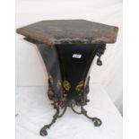 A Regency period tole decorated cast metal coal bin, with lid & liner.