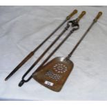A set of brass & steel fire tools.