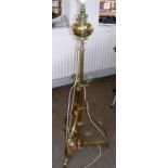 A large brass oil lamp converted to electricity.