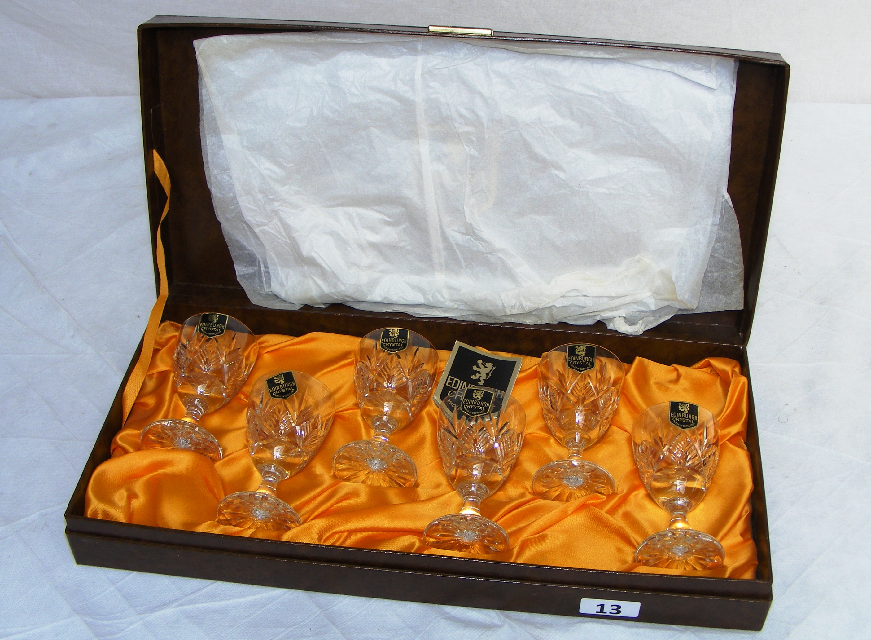 A set of six Edinburgh Crystal glasses in original display case.