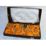 A set of six Edinburgh Crystal glasses in original display case.