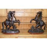 A very large & heavy pair of French solid bronze marley horses signed by Coustou.