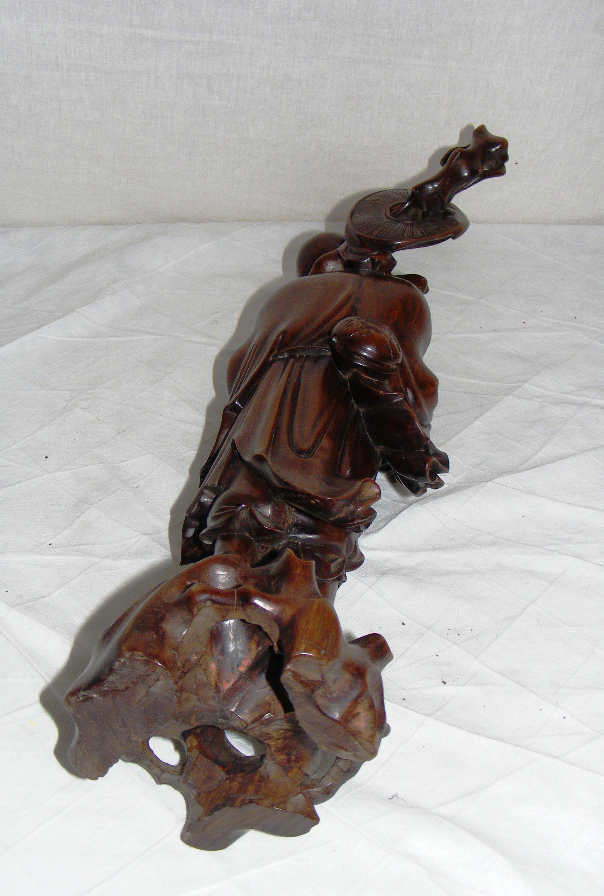 A Chinese hardwood figurine. - Image 6 of 6