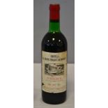 1 Blle	CH. LA GRAVE TRIGANT DE BOISSET	Pomerol	1967	 Mise négoce. Et. un peu tâchée, fanée et