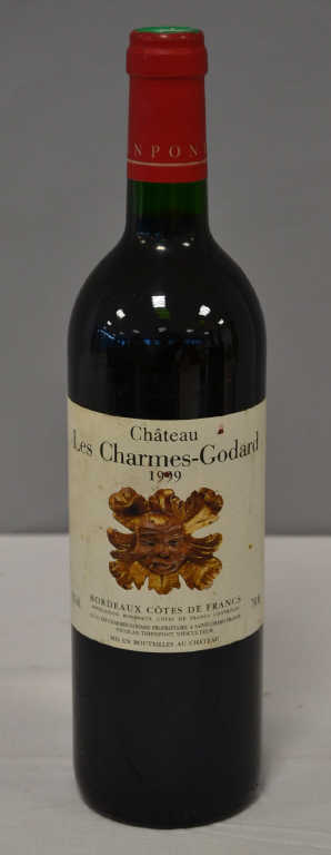1 Blle	CH. LES CHARMES GODARD	Bx 1ères Côtes de Francs	1999	 Et. un peu tâchée. N : mi/bas goulot.