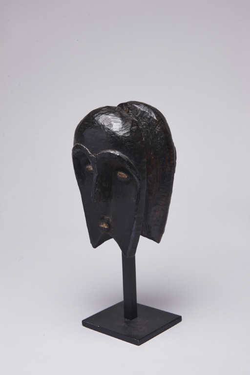 Kwele (Gabon) - Rare et intéressante sculpture en forme de masque "janus", à face concave sous les