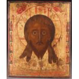 A LARGE RUSSIAN ICON OF THE HOLY VISAGE, PROBABLY NEVYANSK, CIRCA 1850. Executed on an ornate