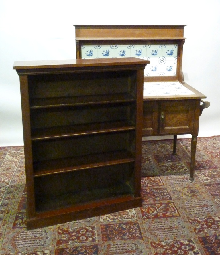 A Mahogany Dwarf Bookcase with an arrang