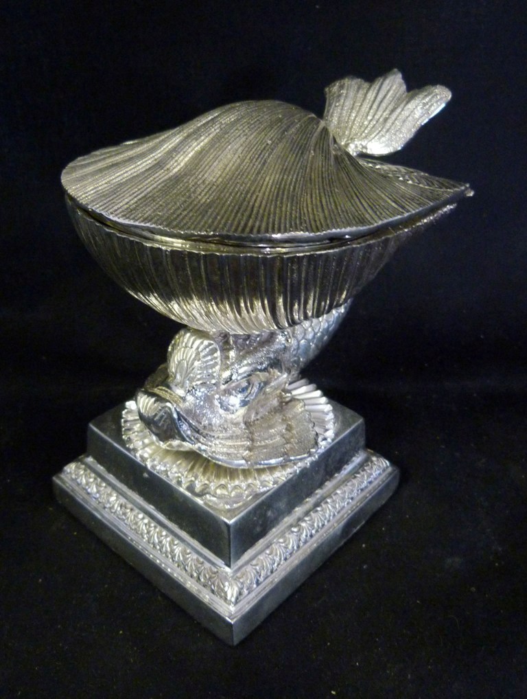 A Silver Plated Ink Well in the form of