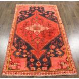 A North West Persian Woollen Rug with a
