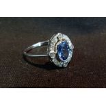 An 18ct. White Gold Sapphire and Diamond