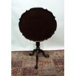 A Mahogny Pedestal Table, the shaped mou