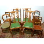 A Set of Four Oak Dining Chairs, with sh