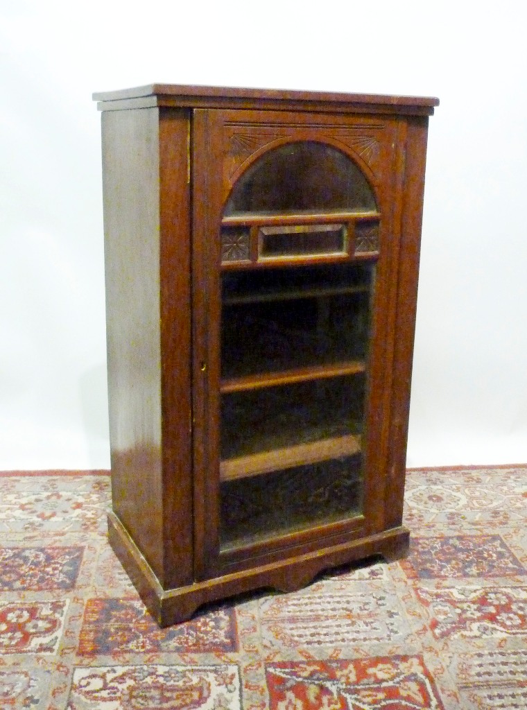 A Victorian Walnut Music Cabinet with a