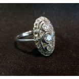 An 18ct. White Gold Diamond Ring, set wi