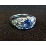 An 18ct. White Gold Sapphire and Diamond