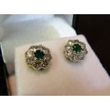 A Pair of 18ct. Yellow Gold Emerald and