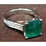 An 18ct. White Gold Emerald and Diamond