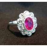 An 18ct. White Gold Ruby and Diamond Rin