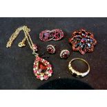 A 9ct. Gold Garnet Set Ring, together wi