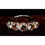 An 18ct. White Gold Five Stone Diamond R