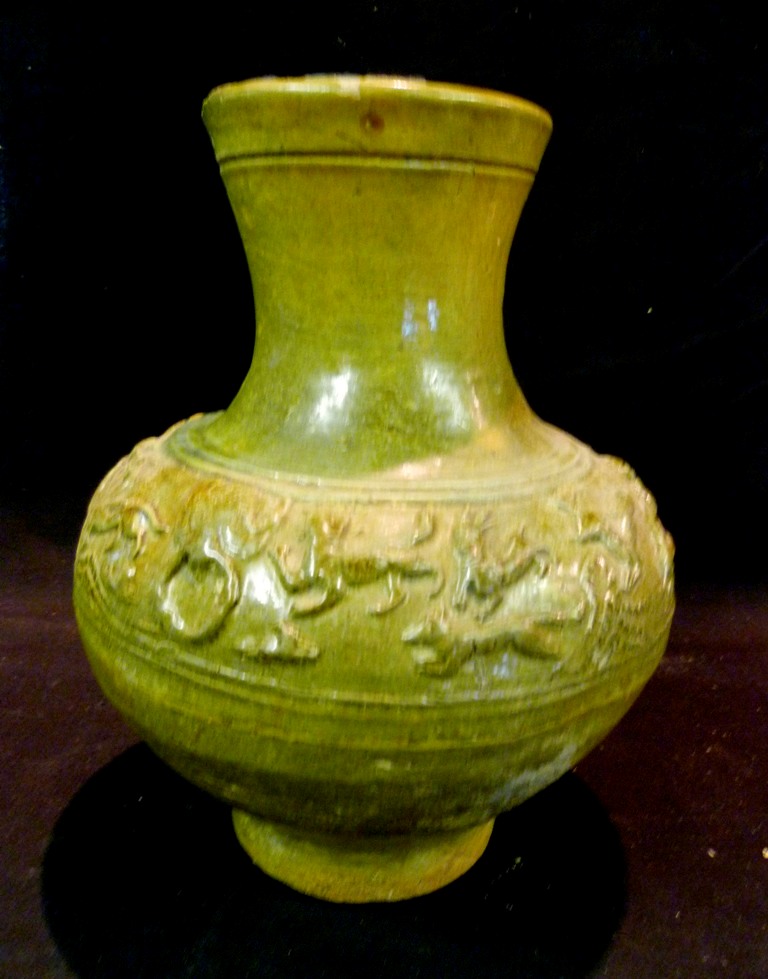 A Chinese Pottery Vase, decorated in rel