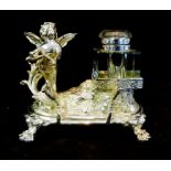 A Silver Plated Ink Stand, with cherub s