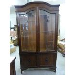 An Early 20th Century Oak Bookcase, the