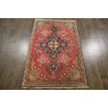 A North West Persian Woollen Rug, with a