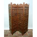 An Indian Carved Hardwood Four Fold Scre