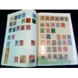 A Stamp Album Containing World Stamps