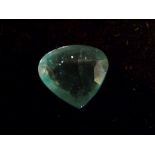 A Large Heart Shaped Cut Green Stone