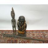 An African Carved Figure, together with