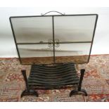 A Wrought Iron Fire Grate with Andirons,