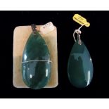 An Oval Green Pendant, together with ano