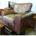 A Beige Leather Club Armchair with cushi