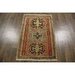 A North West Persian Woollen Rug, with a