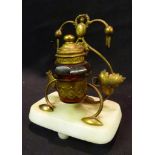 A Cranberry Glass and Gilded Inkwell and