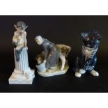 A Royal Copenhagen Porcelain Model of a Fawn upon a pedestal, together with another,