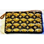 An Everning Dress Ladies Clutch Bag as new, Boxed.