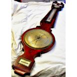 A good quality, 19th C, flame mahogany banjo barometer with swan neck pediment and brass finial. The