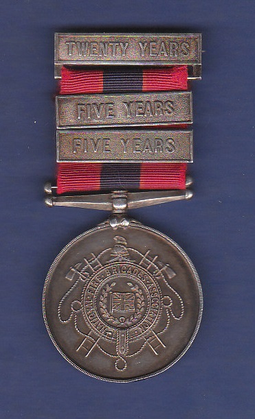 National Fire Brigade Long Service Medal with three bars, named to Mortimer Ambler.