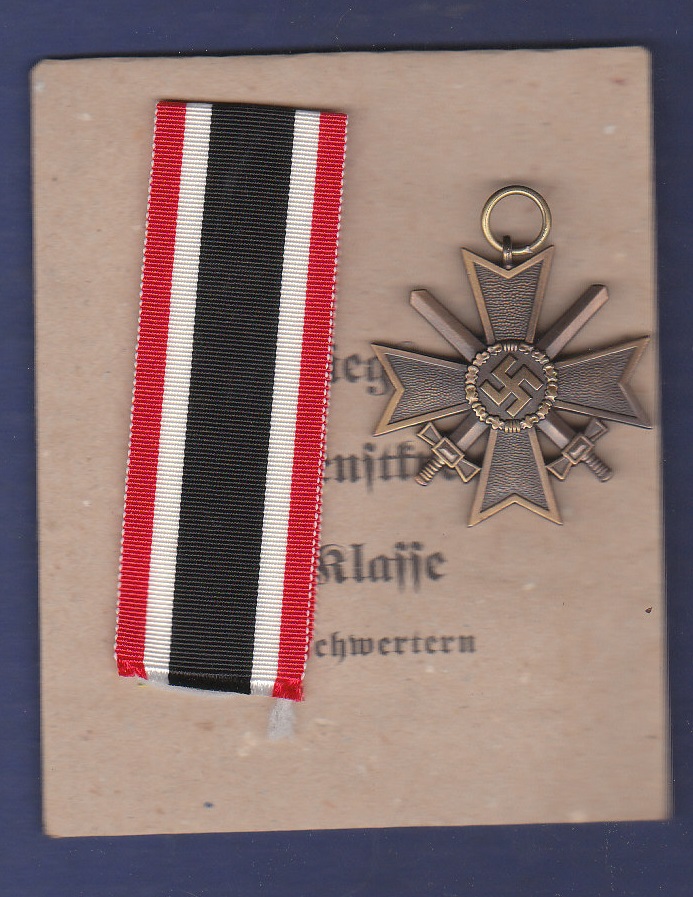 WWII German War Merit Cross with crossed swords in packet. VF