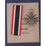 WWII German War Merit Cross with crossed swords in packet. VF