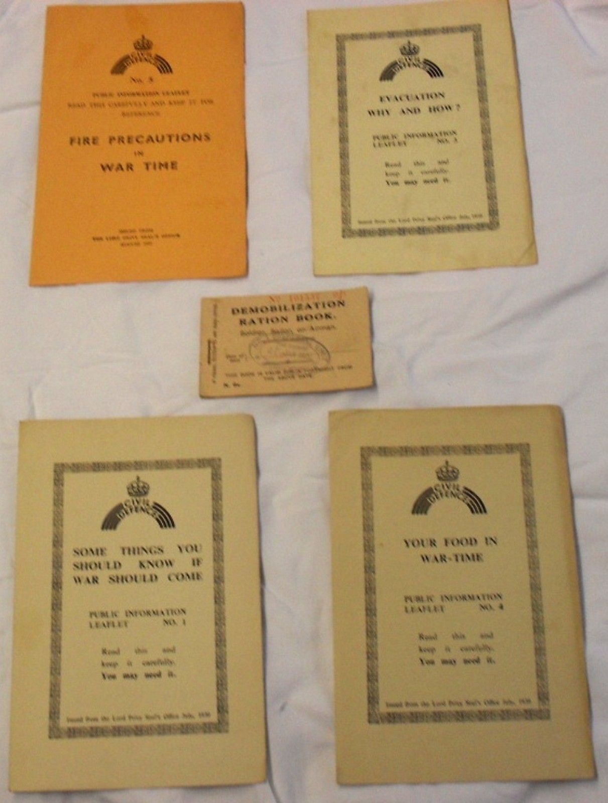 World War II Civil Defence leaflets numbers 1, 3, 4, and 5.  Including a Demobilization Ration
