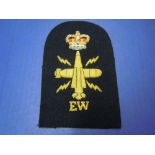 Royal Navy Submarine Trade Patch. Embroided in Gold Bullion with letters EW with a QC