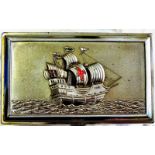 A small silver plated box, Spanish armada frigate on the lid with an ornate pattern, pine lined on