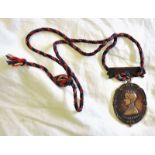 "The Soldiers and Sailors Families Association MDCCCLXXXV" Red and Blue twist Cord, Bronze Medal,