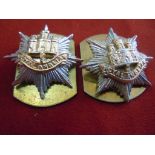 Two Royal Anglian Regiment Cap Badges, in stay bright with their brass plagues.